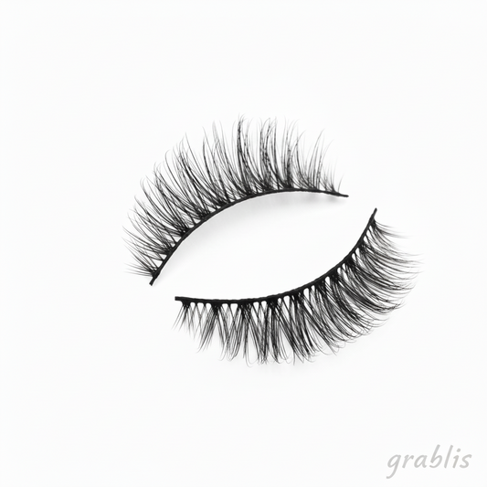 Pair of false eyelashes on a white background